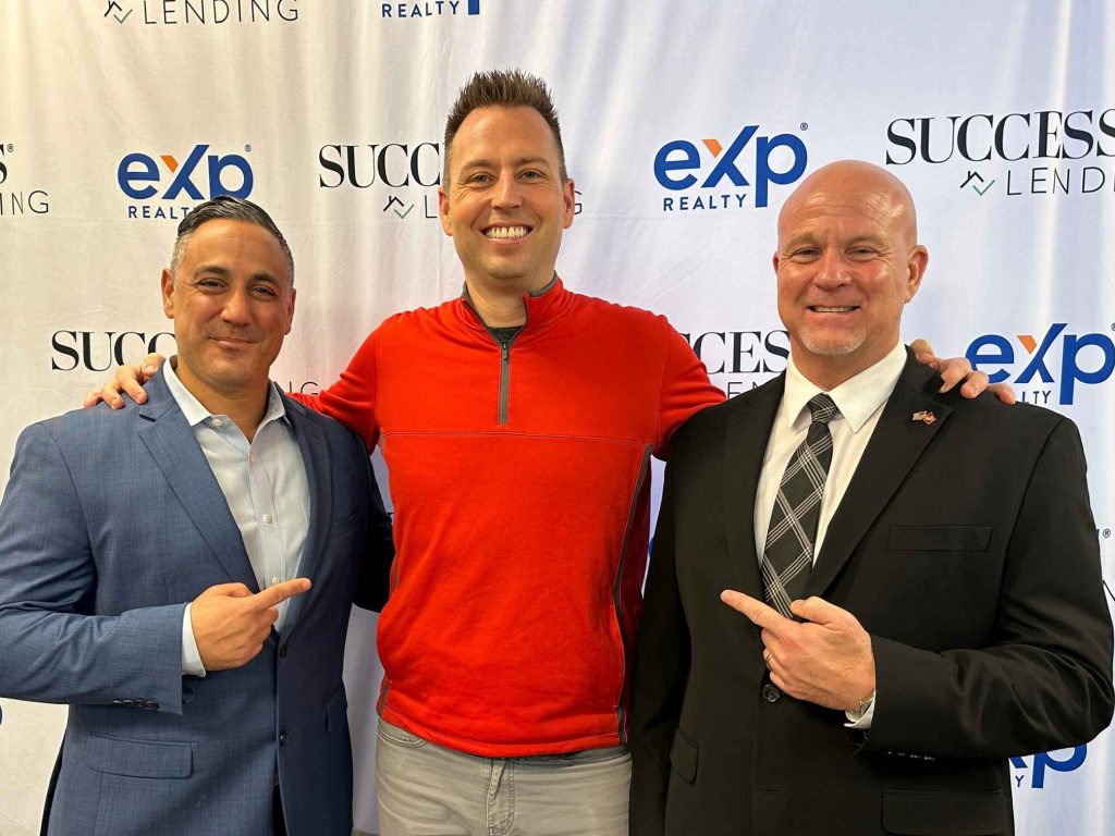 eXp Realty Indiana Managing Brokers Jason Engle & Morris Lucas with real estate agent Tony Anczer
